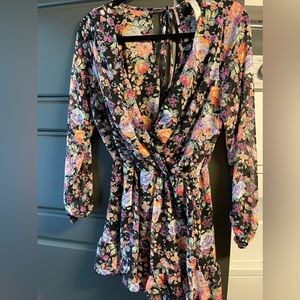 Floral romper with long sleeves